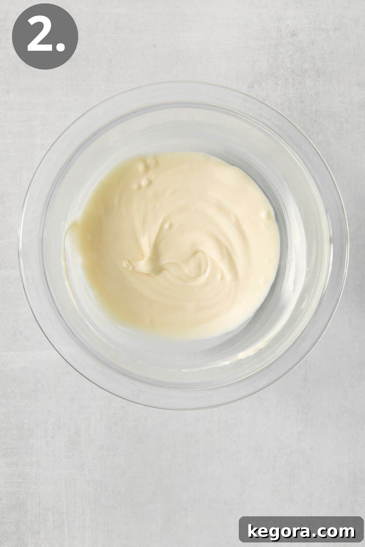 Gourmet White Chocolate Pop 5 Melted white chocolate in a glass bowl
