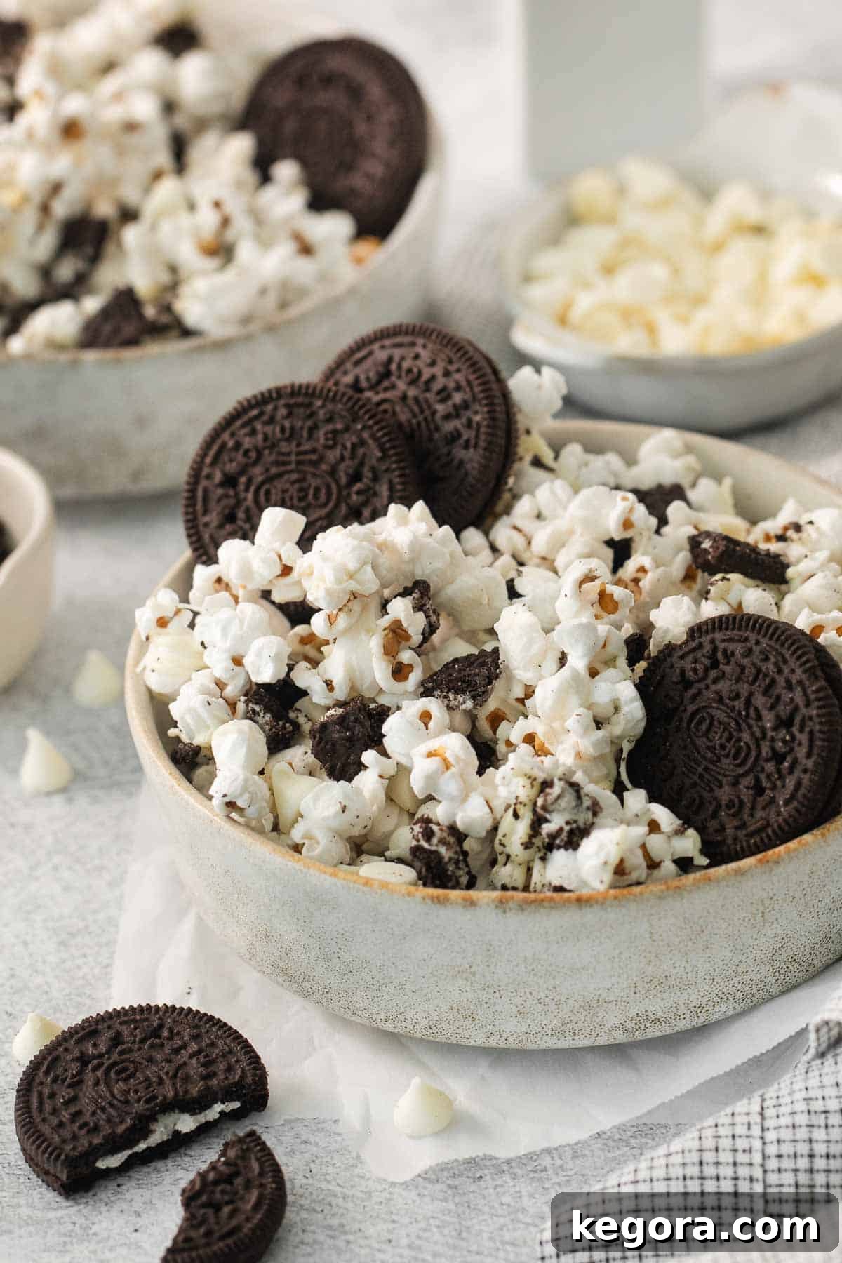 Cookies and Cream Popcorn 2 A large bowl filled with delicious Oreo popcorn, ready to be served and enjoyed.
