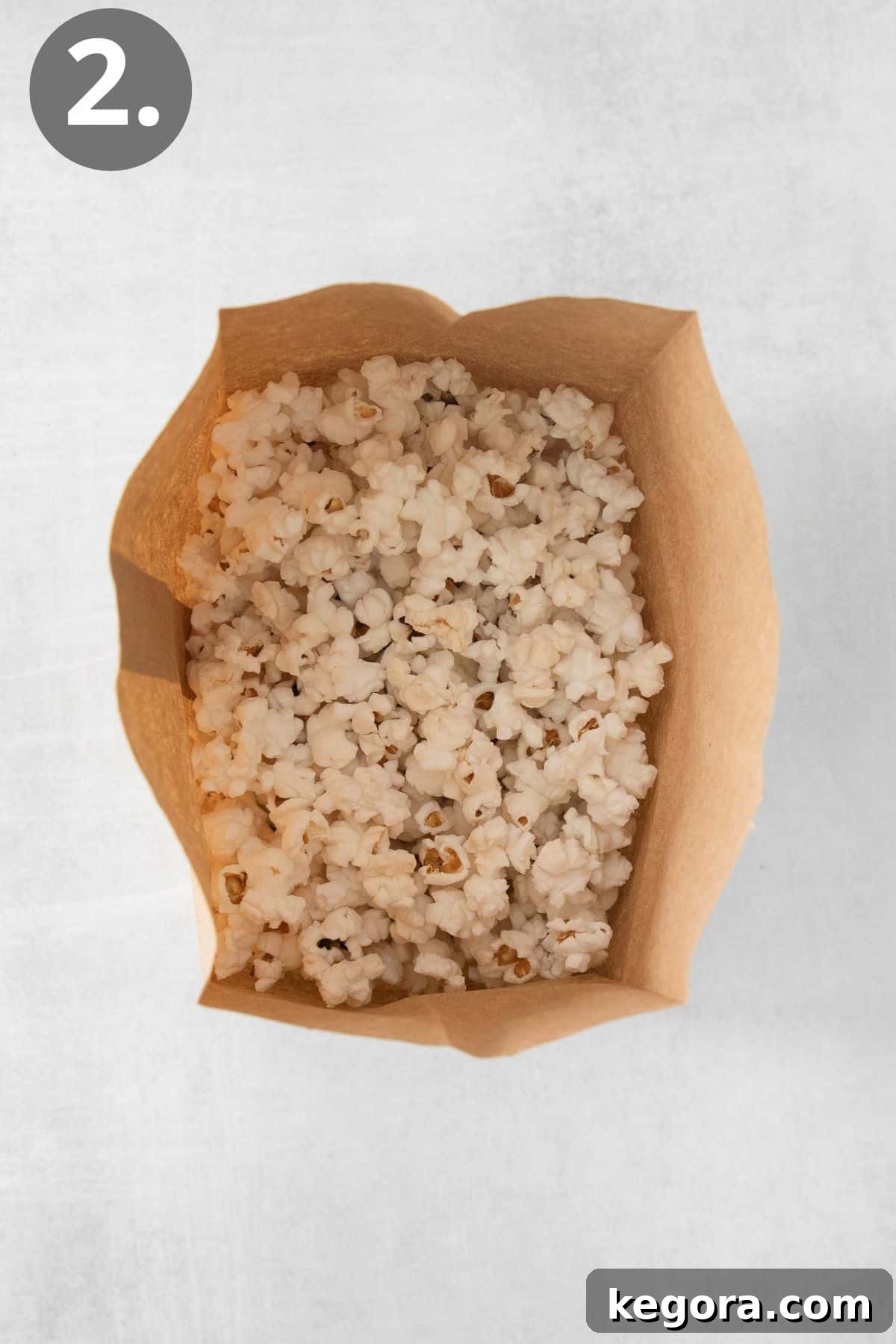 Effortless Caramel Popcorn Treat 5 Popcorn in a brown bag