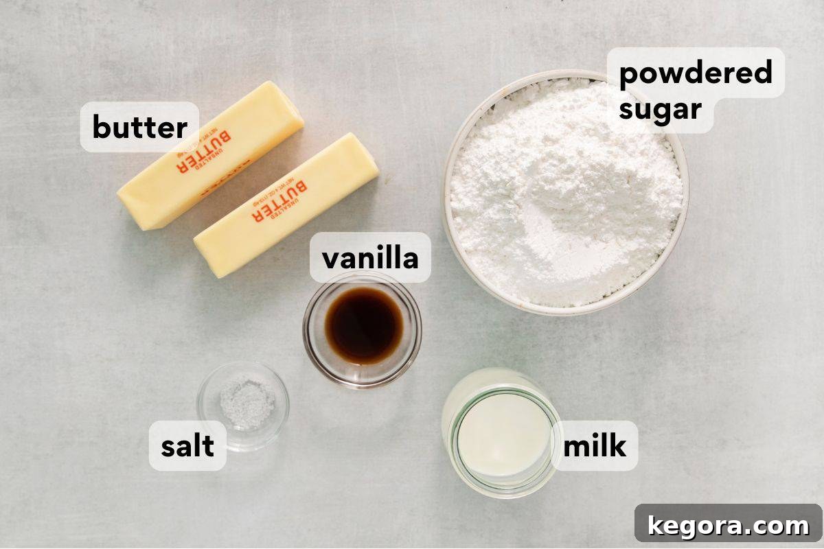 Neatly arranged and labeled ingredients for preparing vanilla buttercream frosting.
