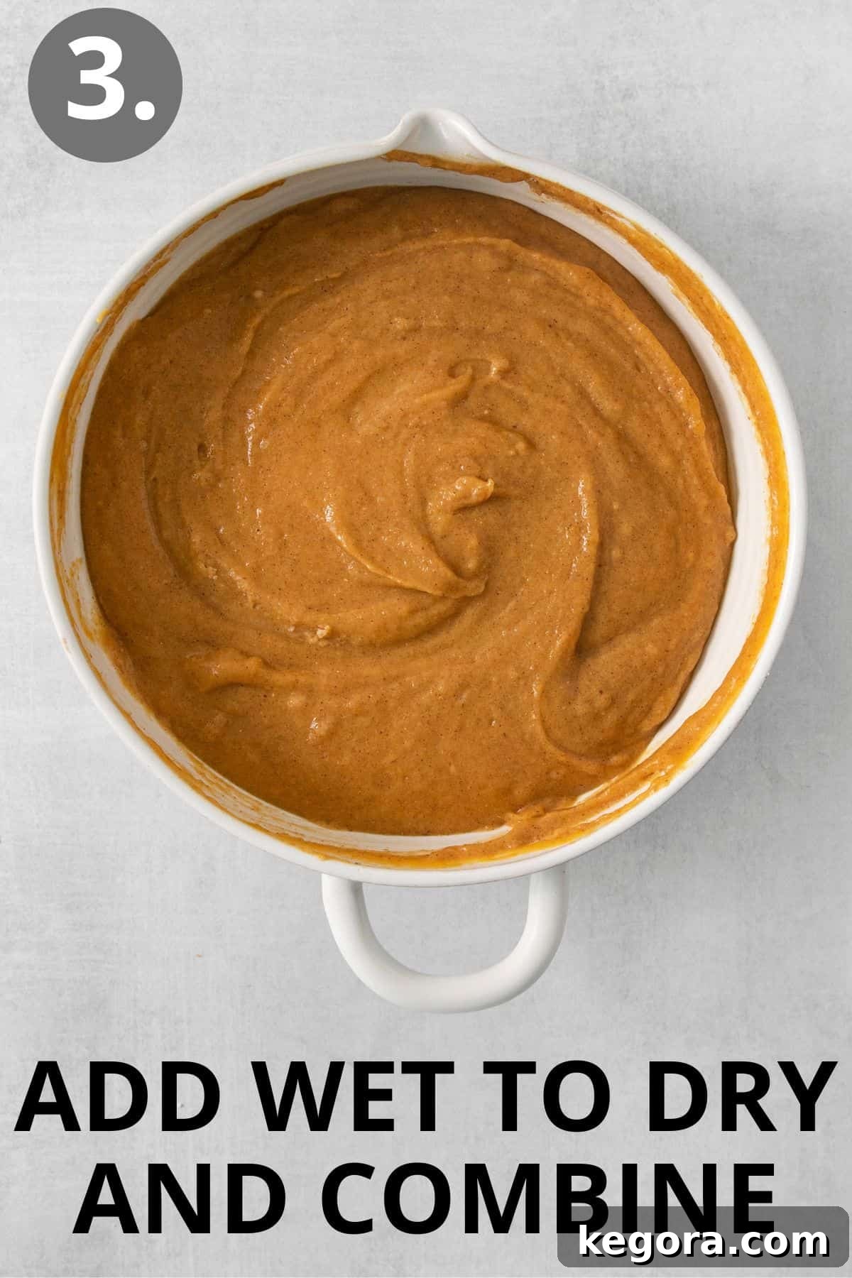 Cozy Gluten-Free Pumpkin Spice Loaf 7 Wet and dry ingredients for gluten-free pumpkin bread combined in a bowl