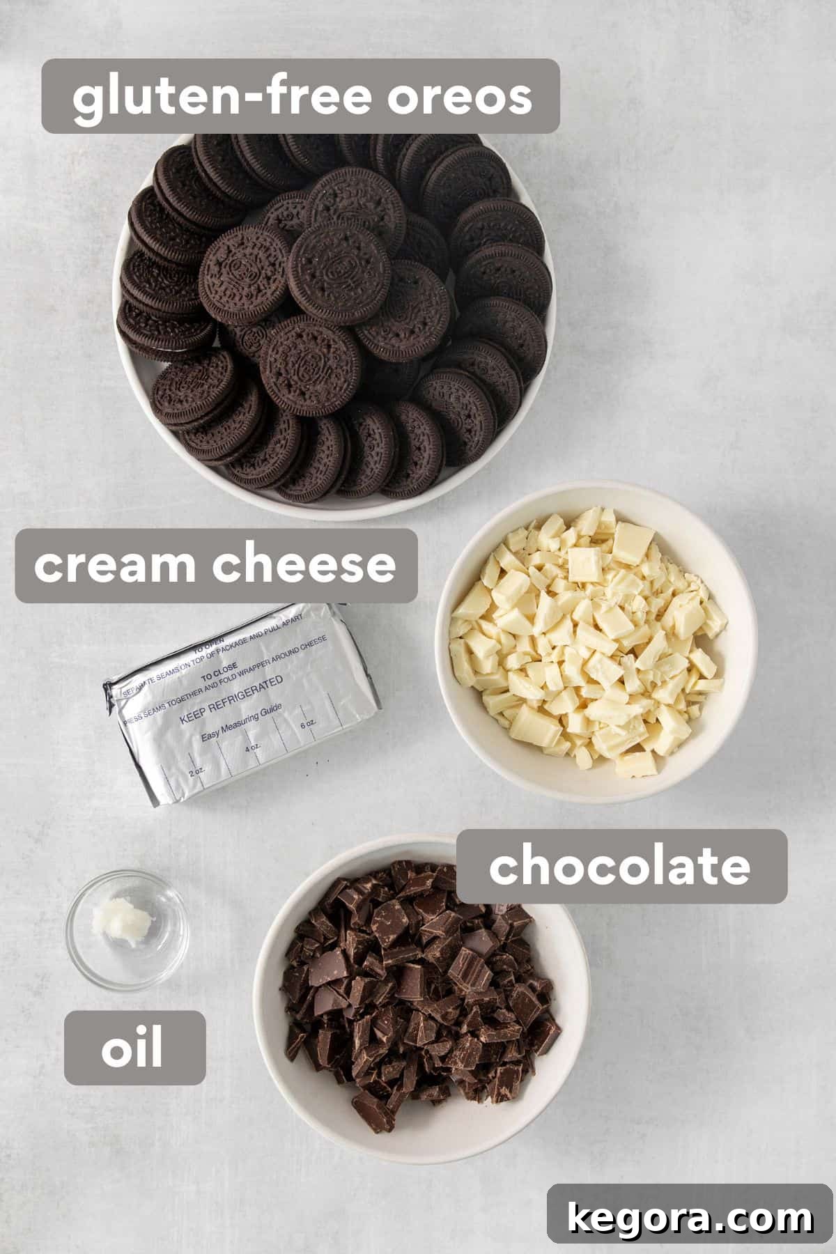 Gluten-Free Oreo Dream Bites 3 A flat lay of ingredients for gluten-free Oreo truffles, including cookies, cream cheese, and chocolate, neatly arranged on a countertop.