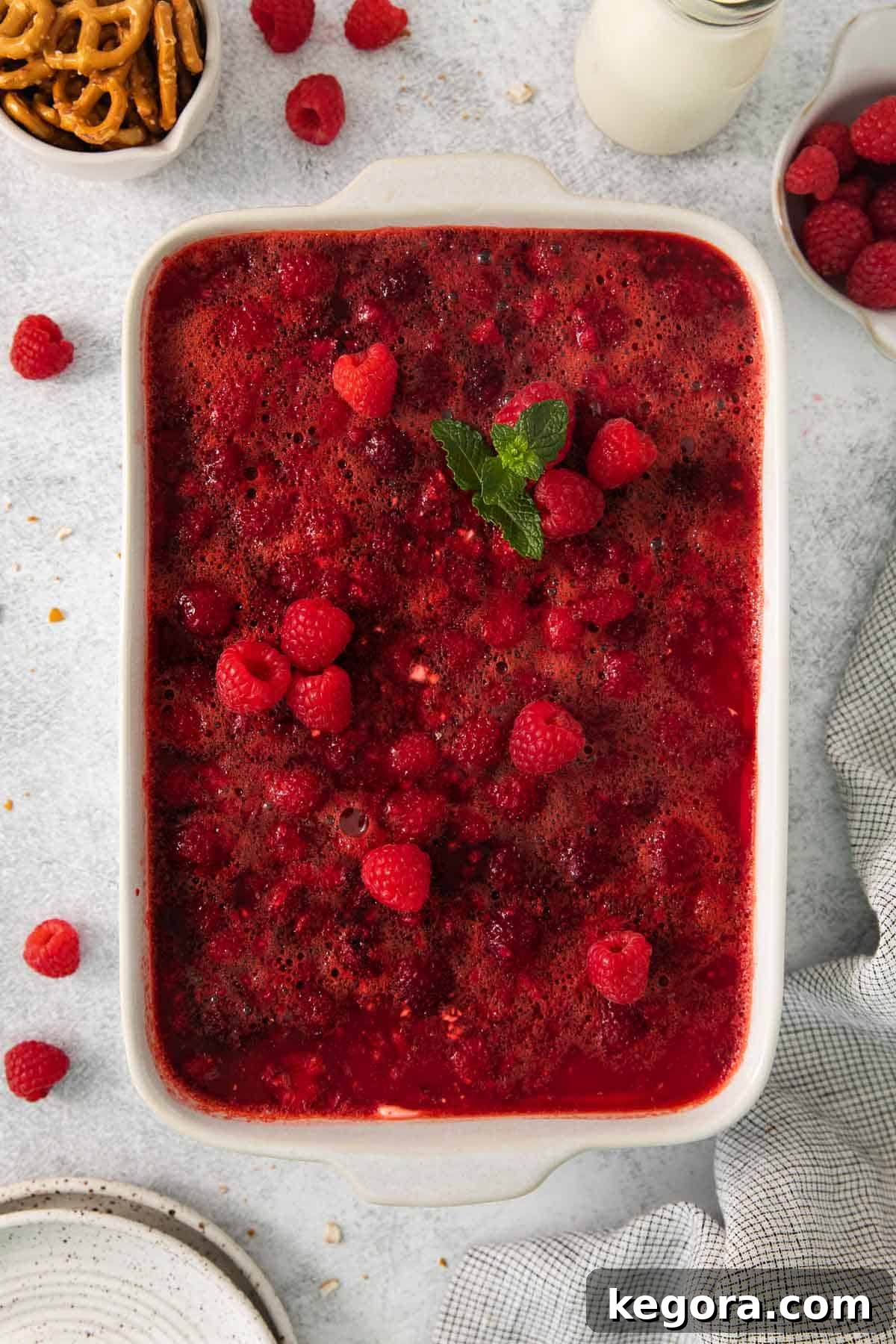raspberry pretzel salad in a baking dish