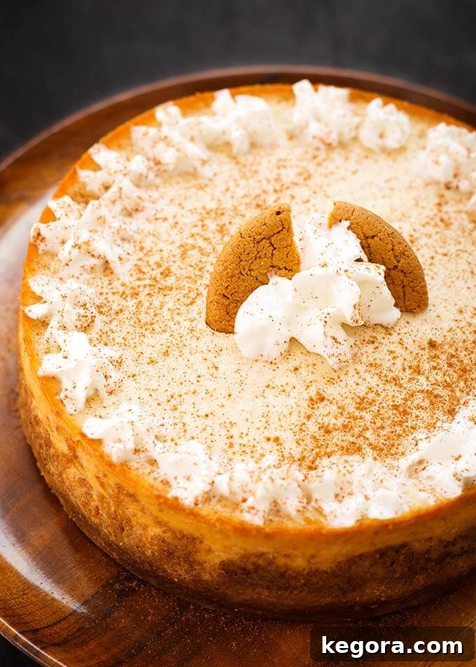 Festive Instant Pot Eggnog Cheesecake 2 Eggnog Cheesecake on a brown plate