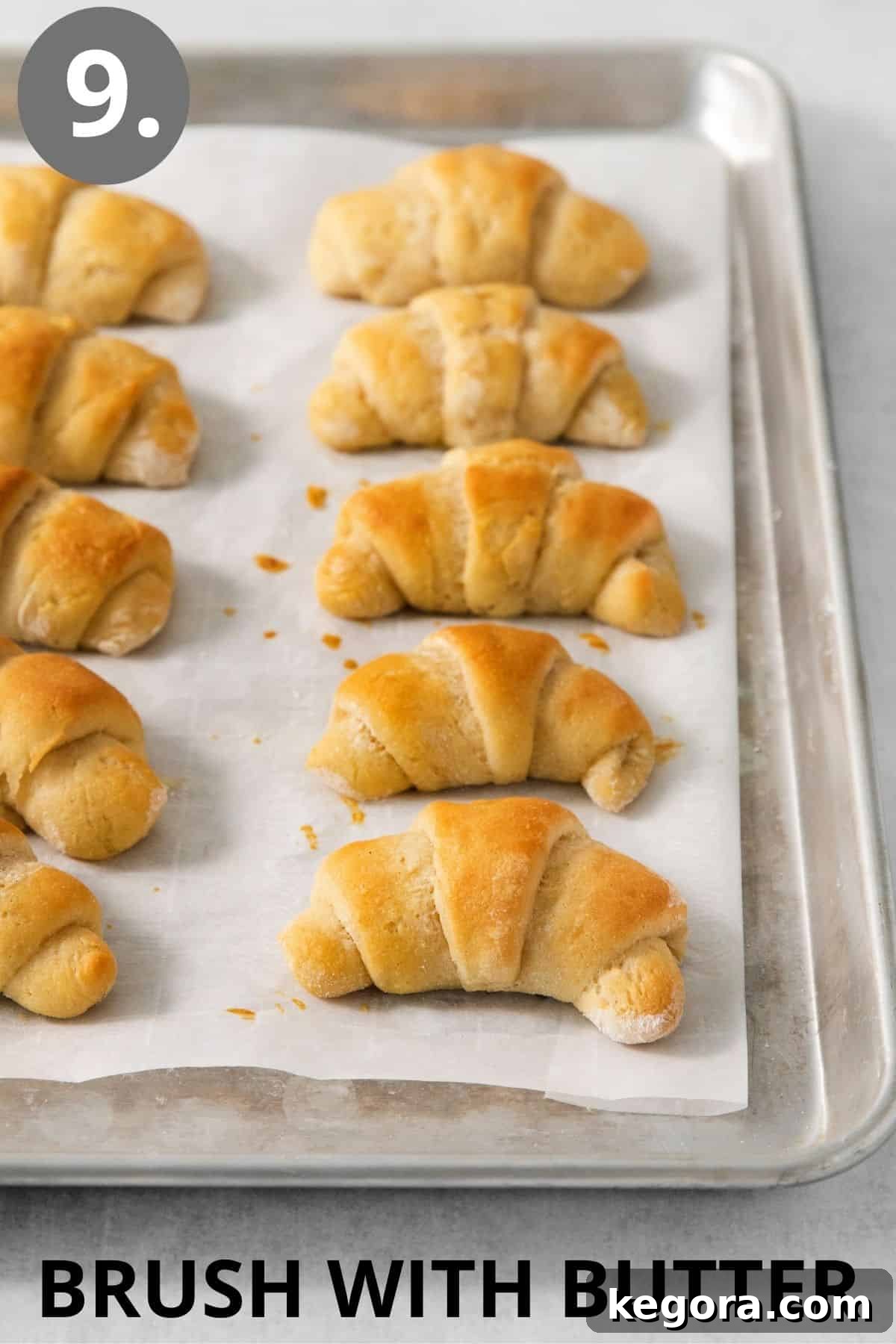 Scrumptious Gluten Free Crescent Rolls 12 Freshly baked gluten-free crescent rolls glistening after being brushed with melted butter, straight from the oven.