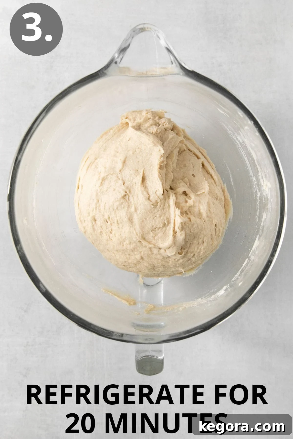 Scrumptious Gluten Free Crescent Rolls 7 Gluten-free crescent roll dough formed into a smooth ball in a glass mixing bowl, ready for refrigeration.