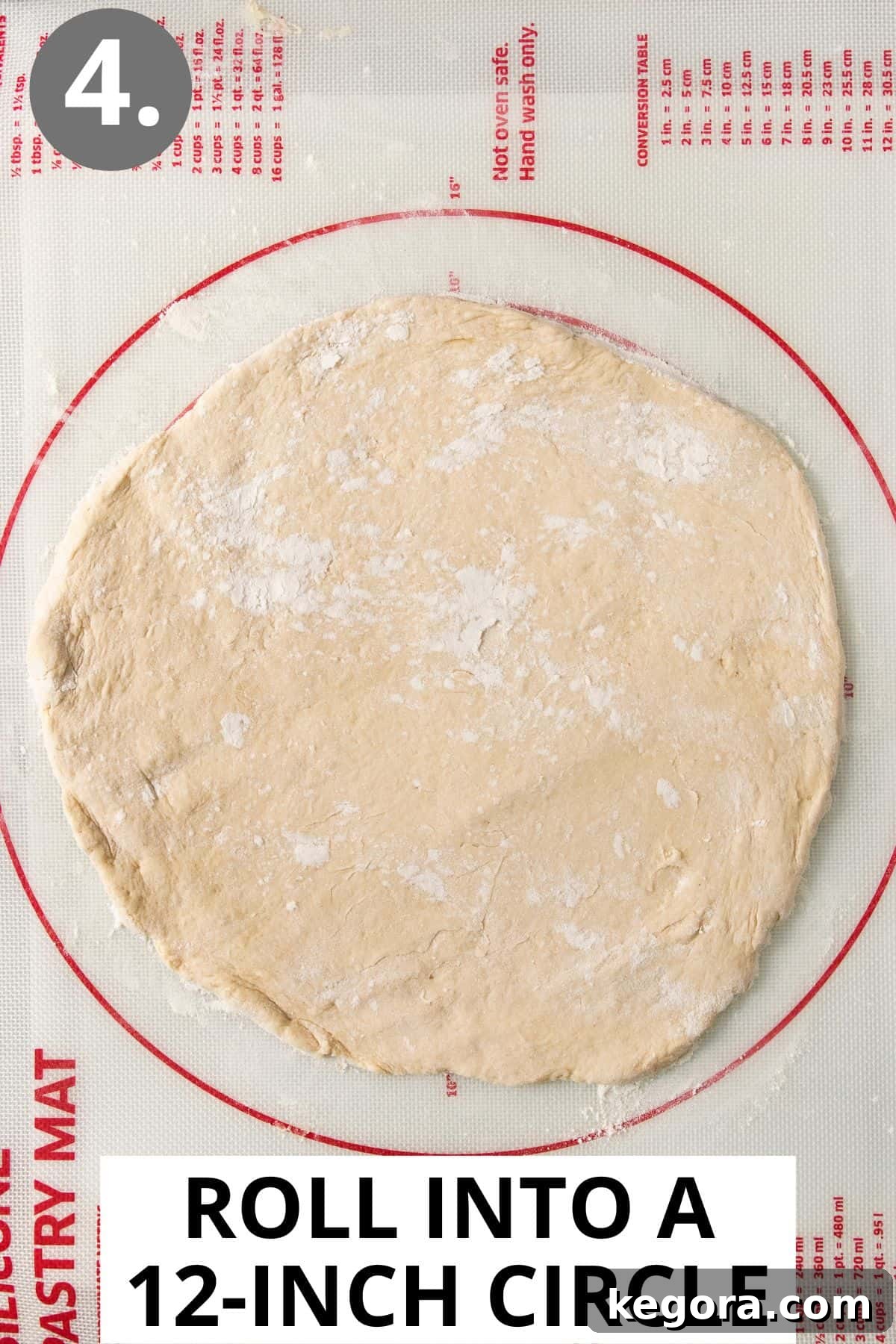 Scrumptious Gluten Free Crescent Rolls 8 Gluten-free crescent roll dough spread into a perfect 12-inch circle on a silicone baking mat, ready for slicing.