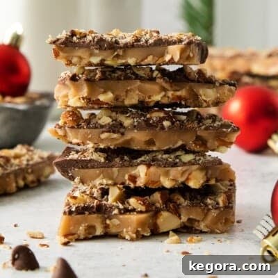English toffee stacked on a countertop, a delicious holiday treat.