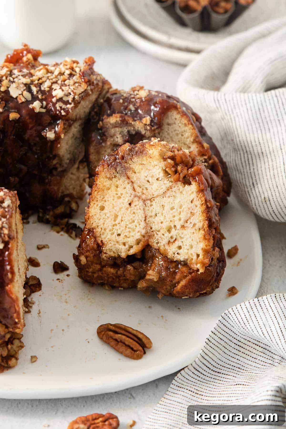 Gooey Gluten-Free Monkey Bread 8 a slice of gluten-free monkey bread on a platter