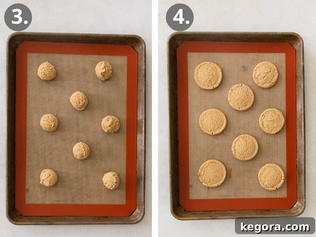 Decadent Gluten Free Peanut Butter Bites 6 Perfectly scooped, uniform gluten-free peanut butter cookie dough balls arranged neatly on a parchment-lined baking sheet, ready for the oven. A metal cookie scoop rests beside them.