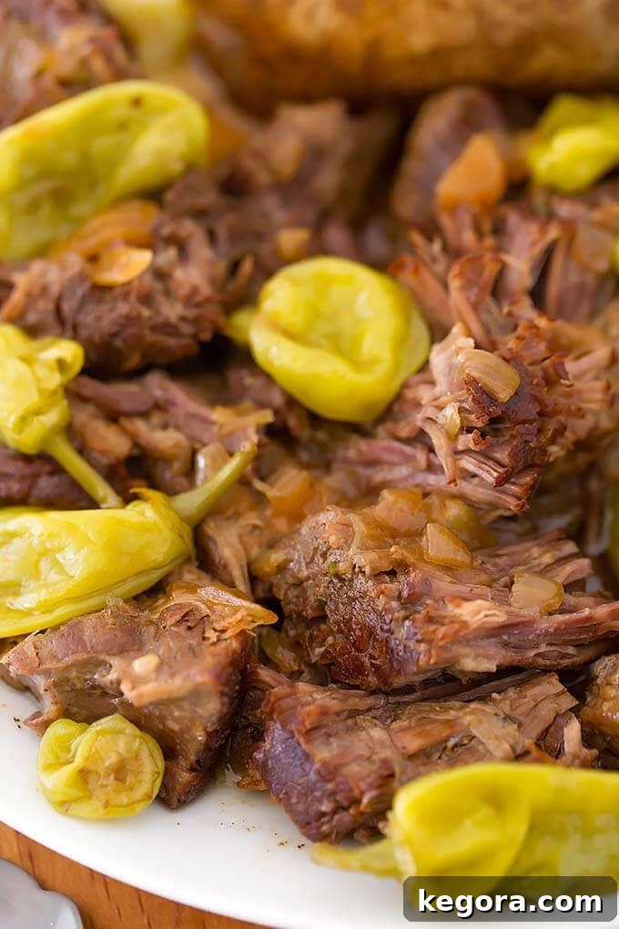 15 Instant Pot Hacks for Effortless Cooking 3 Instant Pot Mississippi Pot Roast on a white plate