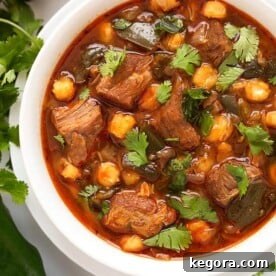Speedy Instant Pot Pork Posole 5 Instant Pot Posole - Pork Stew is Posole with a few extras. Poblano chile peppers and chipotle make this a spicy one pot meal. ¡Es muy deliciosa! simplyhappyfoodie.com #instantpotrecipes #instantpotposole #instantpotpozole #instantpotporkstew #pressurecookerrecipes