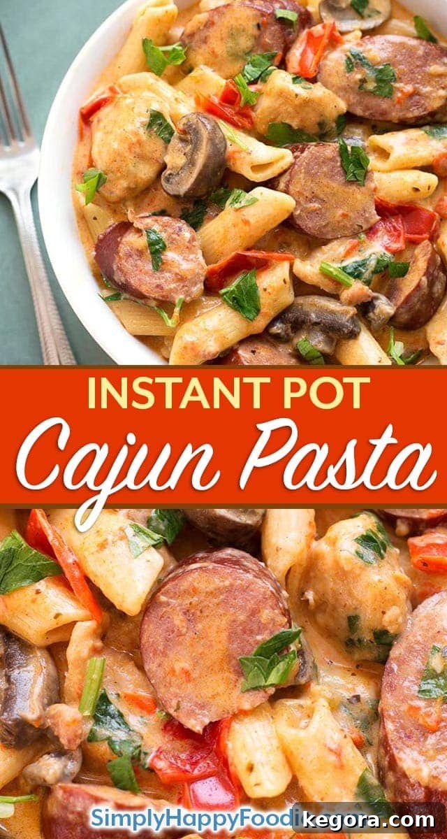Instant Pot Creamy Cajun Pasta with Sausage is a delicious one pot meal with penne pasta, smoky kielbasa, red bell pepper, and a creamy sauce. Pressure cooker Cajun pasta is so good! Instant pot recipes by simplyhappyfoodie.com #instantpotpasta #instantpotcajunpasta