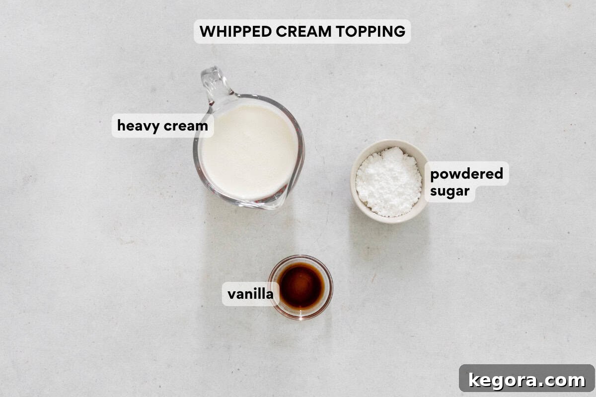 Additional whipped cream topping ingredients for Chocolate Angel Pie, including heavy cream and vanilla extract, arranged on a countertop.