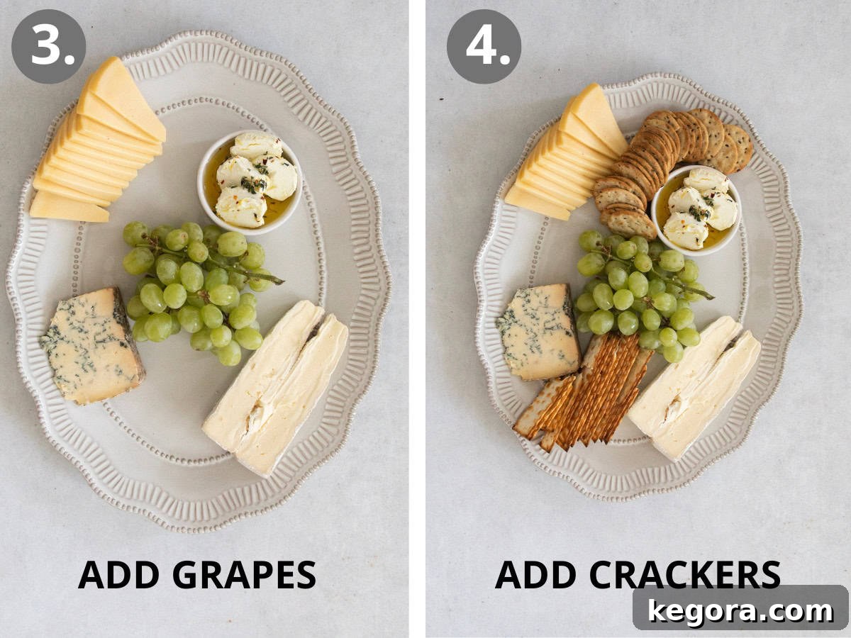 Gluten Free Grazing Board 8 A cluster of grapes placed at the center of a gluten-free charcuterie platter, with crackers being arranged around them.