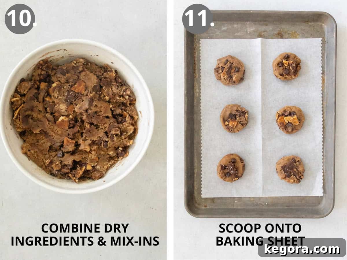 A bowl containing combined wet and dry cookie ingredients with chocolate chips and Christmas crack, next to scooped cookie dough balls topped with extra toffee on a baking sheet.