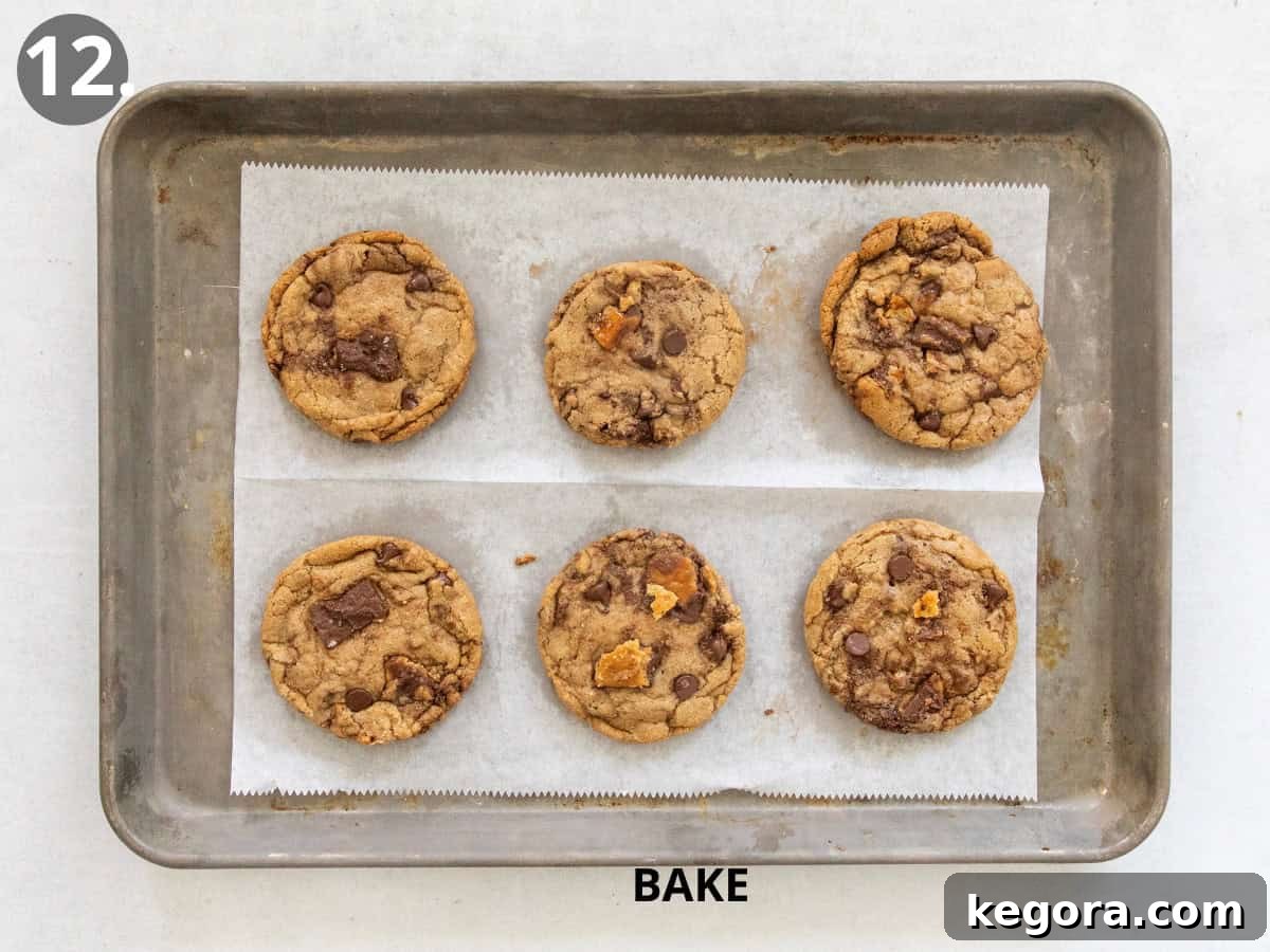 Freshly baked Gluten-free Christmas crack cookies cooling on a wire rack, glistening with melted chocolate and toffee.