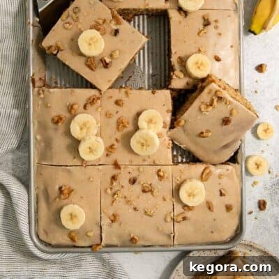 An overhead view of gluten-free brown butter banana bars in a jelly roll pan
