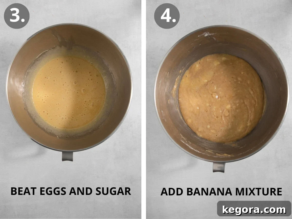 Eggs and sugar whisked in a bowl and mashed bananas mixed in