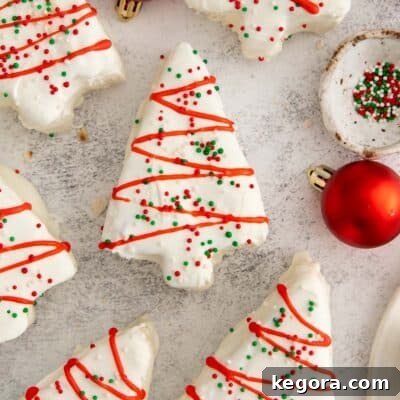 gluten-free little debbie christmas trees with white chocolate and festive decorations.
