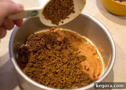 Effortless Instant Pot Taco Bake 5 Seasoned ground meat layered over beans