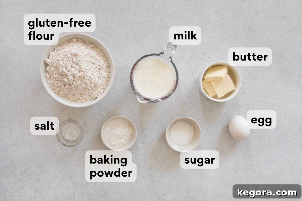 Measured ingredients for drop biscuits, including gluten-free flour, milk, and butter, laid out for baking.