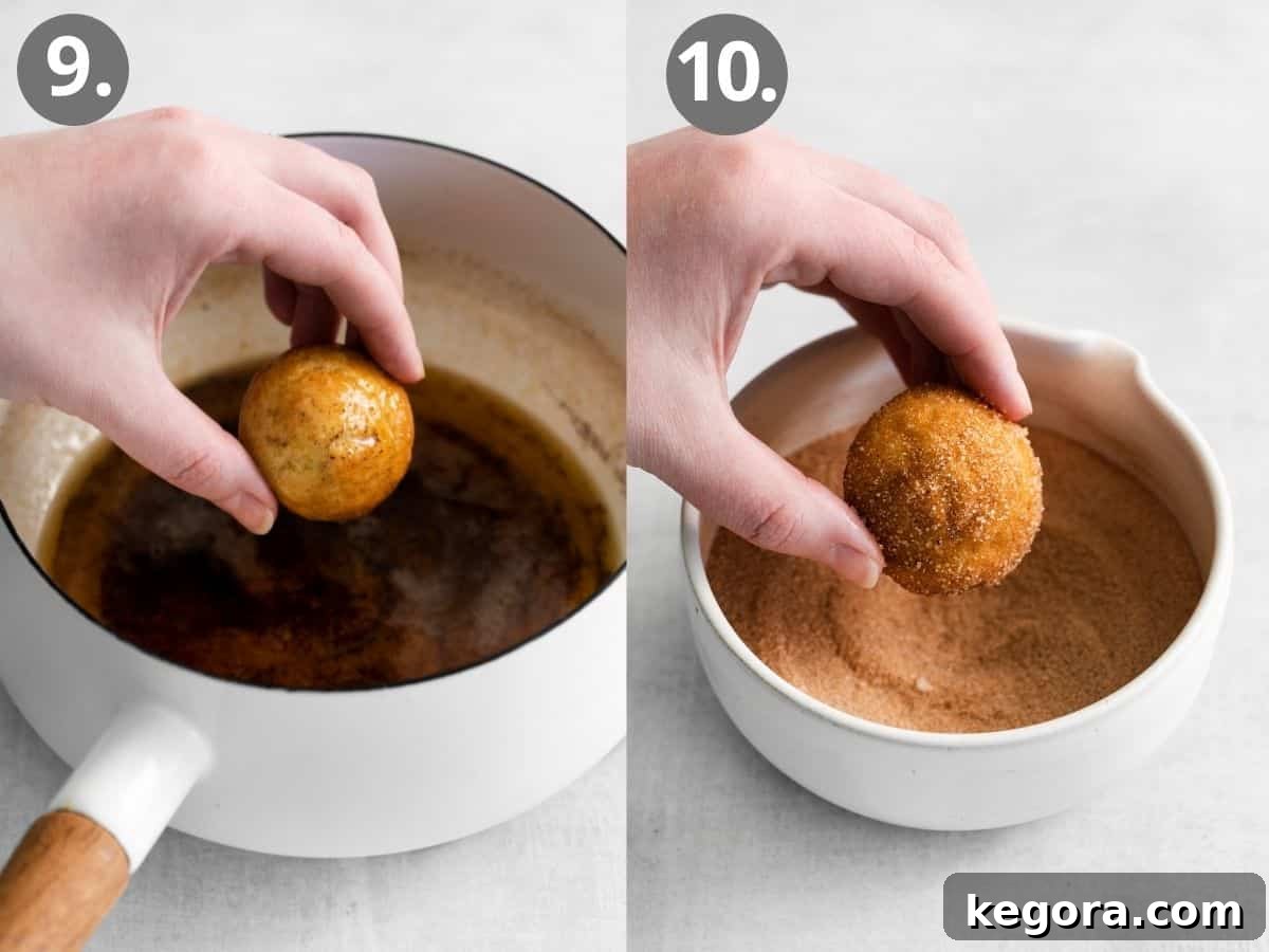 A hand dipping baked puffs into brown butter, then rolling them in a bowl of cinnamon sugar.