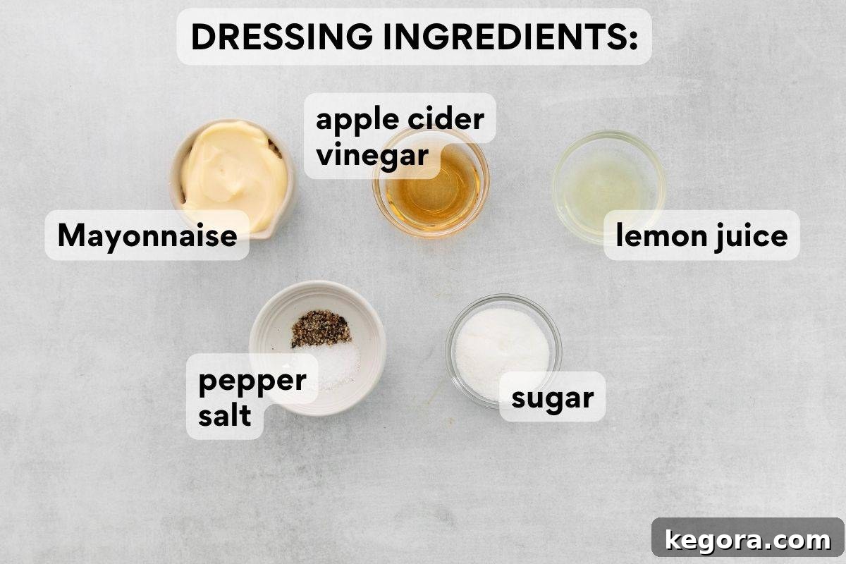 Pre-measured mayonnaise, lemon juice, apple cider vinegar, granulated sugar, salt, and pepper in separate bowls, for the dairy-free coleslaw dressing.