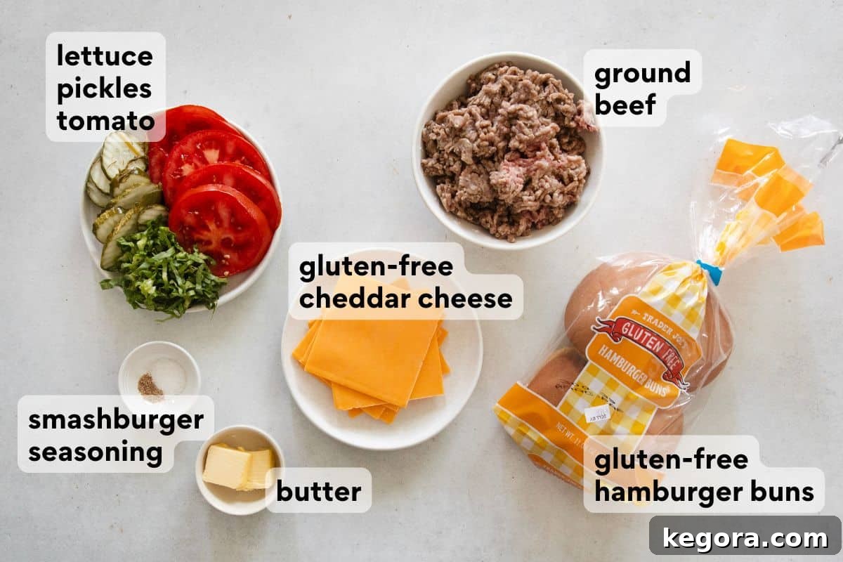 Assortment of fresh smashburger ingredients including ground beef, gluten-free buns, cheese, lettuce, tomato, and sauce components, neatly arranged and labeled on a rustic wooden board.