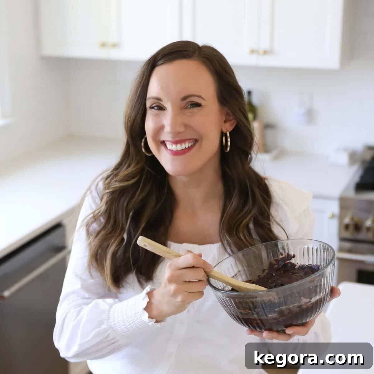 Decadent Gluten-Free Texas Sheet Cake 2 Smiling woman, Erin, with a friendly expression, suggesting expertise in baking.