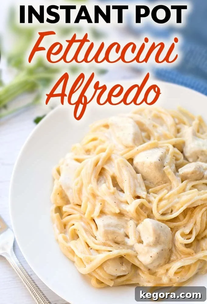 Instant Pot Fettuccine Alfredo with chicken on white plate with title