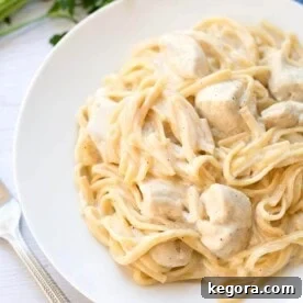 Fettuccine Alfredo on a white plate