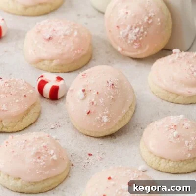 peppermint meltaways with pink icing and candy cane pieces.