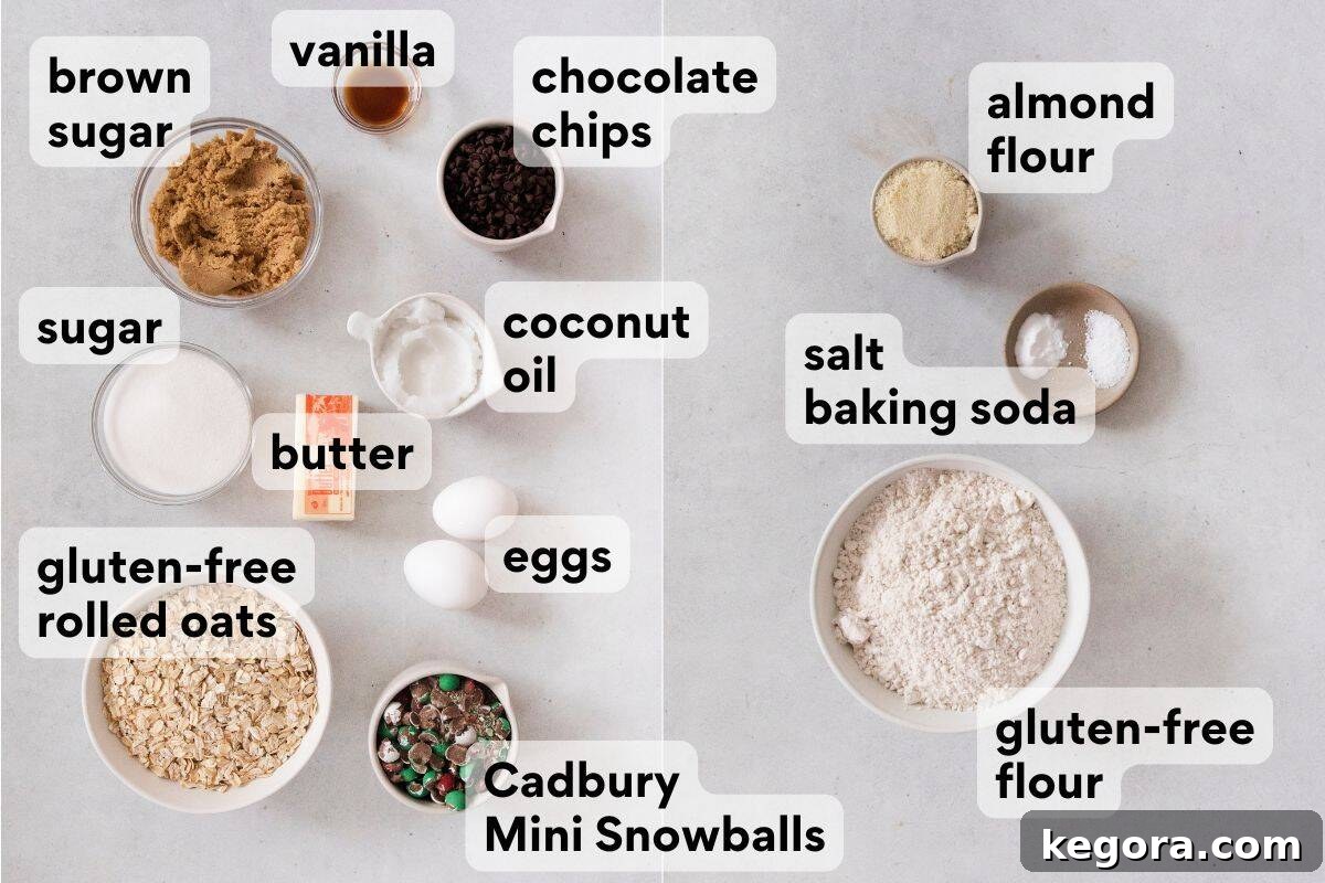 A beautifully arranged spread of ingredients for Cadbury Snowball cookies, including gluten-free flour, almond flour, certified gluten-free oats, butter, sugar, and the signature Cadbury Mini Snowballs, all measured and ready for baking.