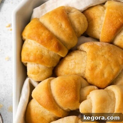 Gluten-free crescent rolls in a bowl with a towel