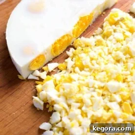 Round Egg Loaf with half crumbled, showcasing the perfect texture