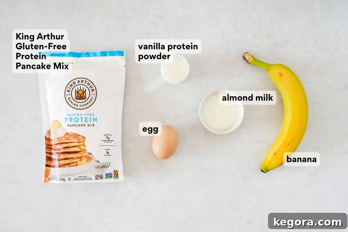 Protein Packed Gluten Free Dairy Free Banana Pancakes 4 Gluten-Free Banana Protein Pancakes ingredients on a countertop.
