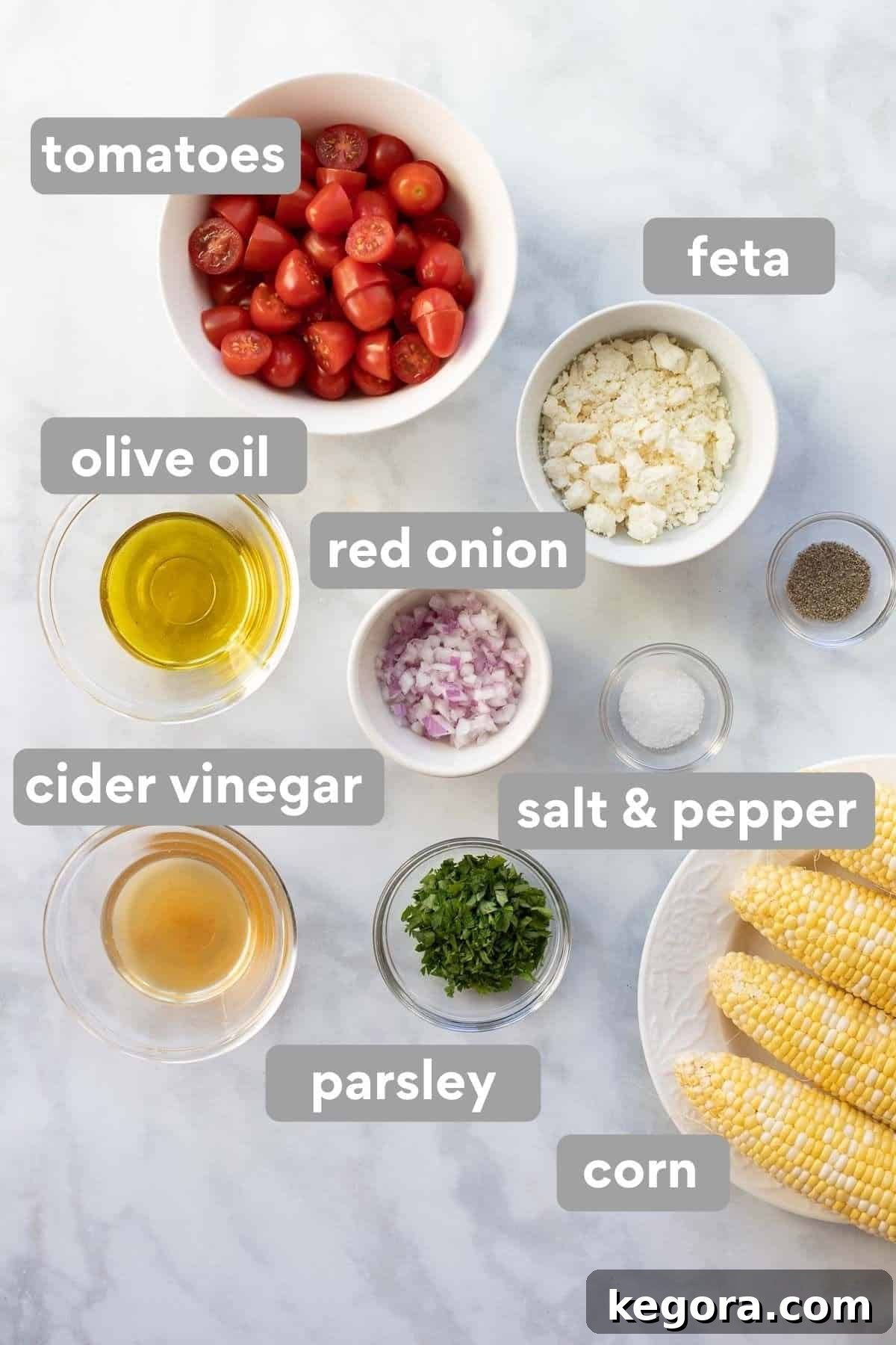 Overhead shot showcasing the fresh ingredients required to prepare a delicious corn salad.