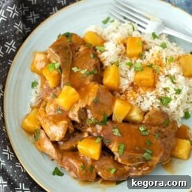 Pressure Cooker Sticky Sweet and Sour Country Ribs 5 Sweet and Sour Country Ribs on a bluish-gray plate