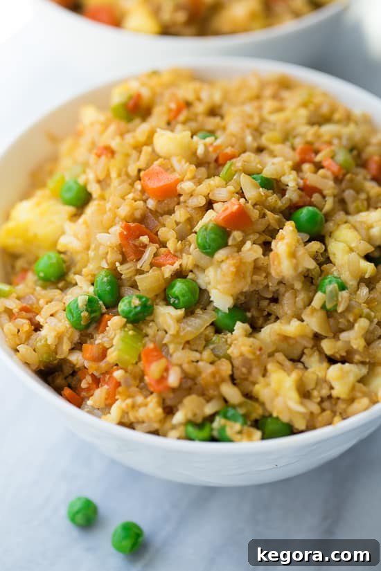 50/50 Cauliflower and Brown Rice Fried Rice Gluten Free 4 Another enticing photo of the 50/50 Cauli-Brown Rice Fried Rice, emphasizing its appeal as a healthy, easy, and yummy dinner option.