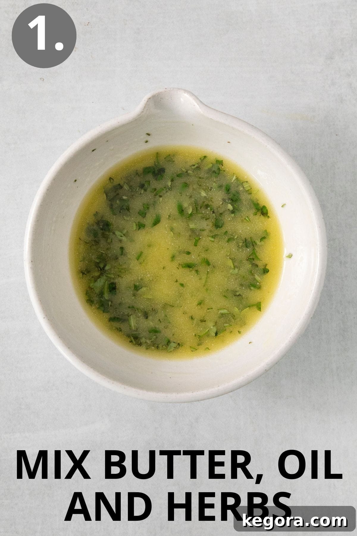 butter, oil, and herbs in a bowl