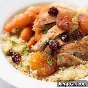 Fragrant Moroccan Slow-Cooker Chicken 2 moroccan chicken over quinoa in white bowl