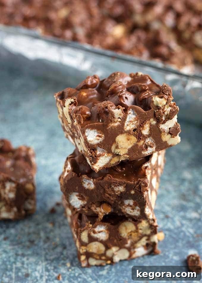Decadent Chocolate Peanut Butter Bars 2 Closeup of Three stacked 5 Ingredient Chocolate Peanut Bars