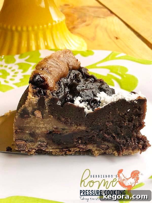A delectable slice of Crownie served on a white plate, showcasing its rich, layered texture.