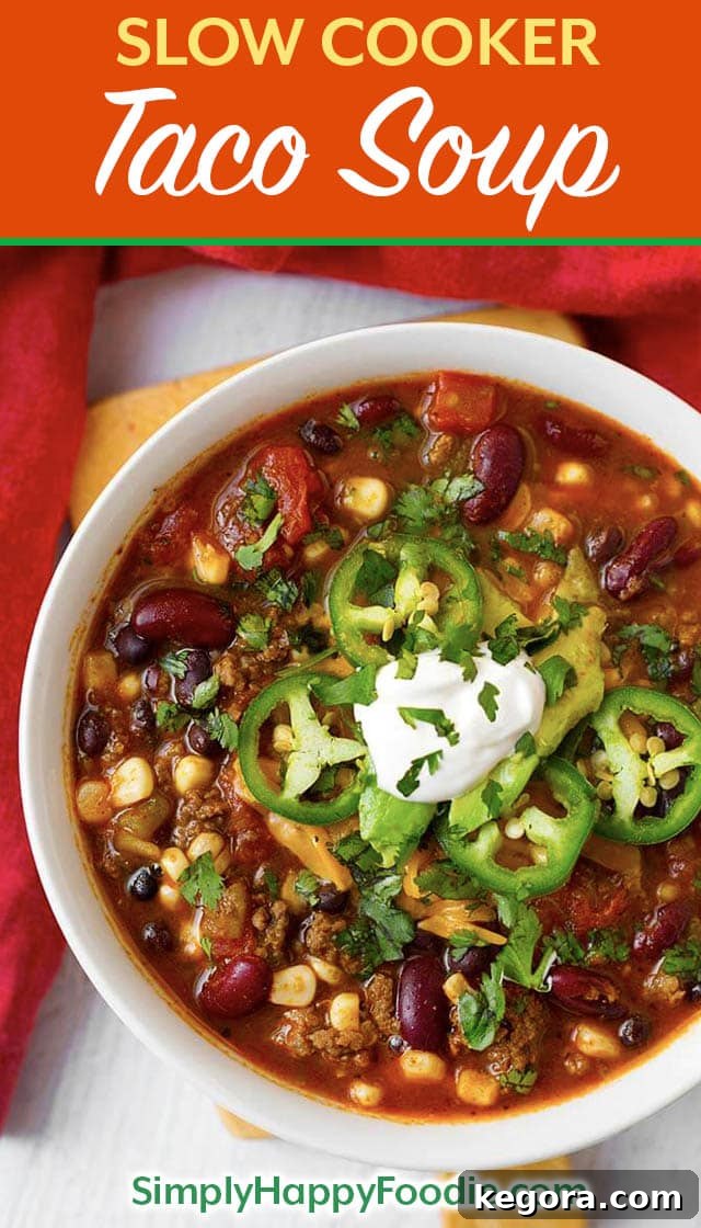 Slow Cooker Taco Soup is tasty Mexican soup that uses up some of the canned goods that are hanging out in your pantry. With beans, corn, ground beef or turkey, and some flavorings, you can easily make this delicious crock pot Taco Soup! simplyhappyfoodie.com #tacosoup #slowcookertacosoup #crockpottacosoup Crock Pot recipes and Slow cooker recipes