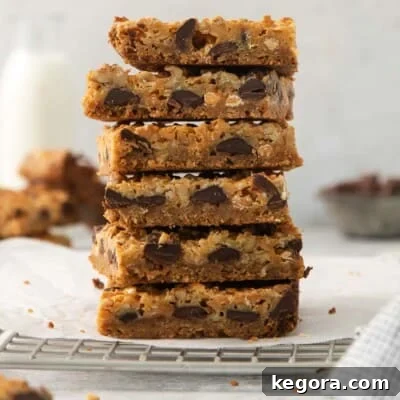 Gluten-Free Magic Bars 12 7-layer bars stacked on a cooling rack