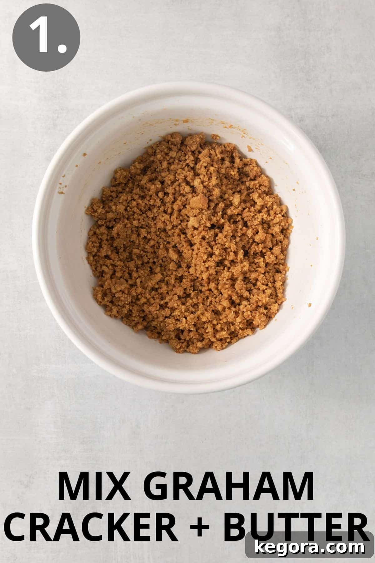 Gluten-Free Magic Bars 4 A bowl containing gluten-free graham cracker crumbs and melted butter, ready to be mixed for the crust.