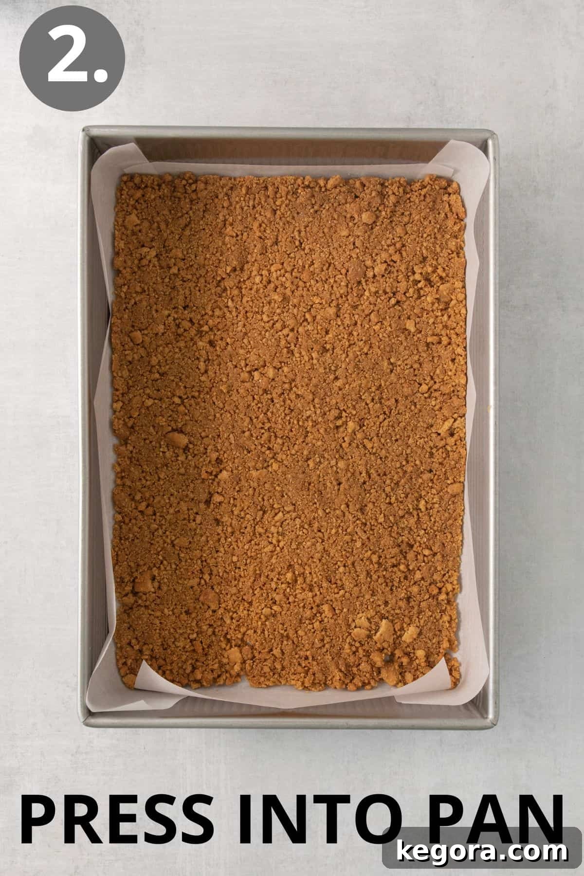 Gluten-Free Magic Bars 5 The graham cracker and butter mixture firmly pressed into the bottom of a baking pan, forming the crust.