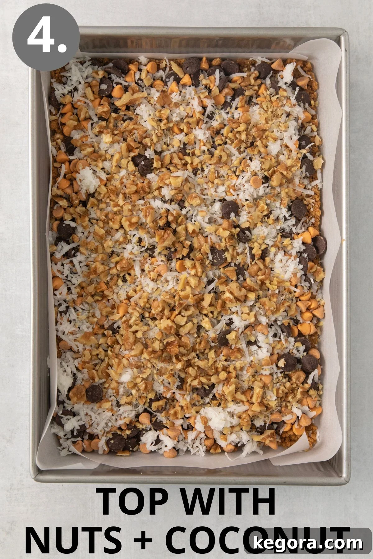 Gluten-Free Magic Bars 7 A close-up shot of the 7-layer bars, showing the vibrant layers of nuts and coconut sprinkled over the chocolate and butterscotch chips.