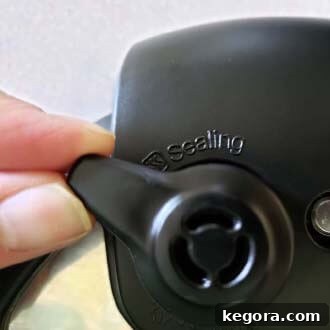 Instant Pot First Use Water Test 7 putting the pressure release knob to the sealing position on an Instant Pot